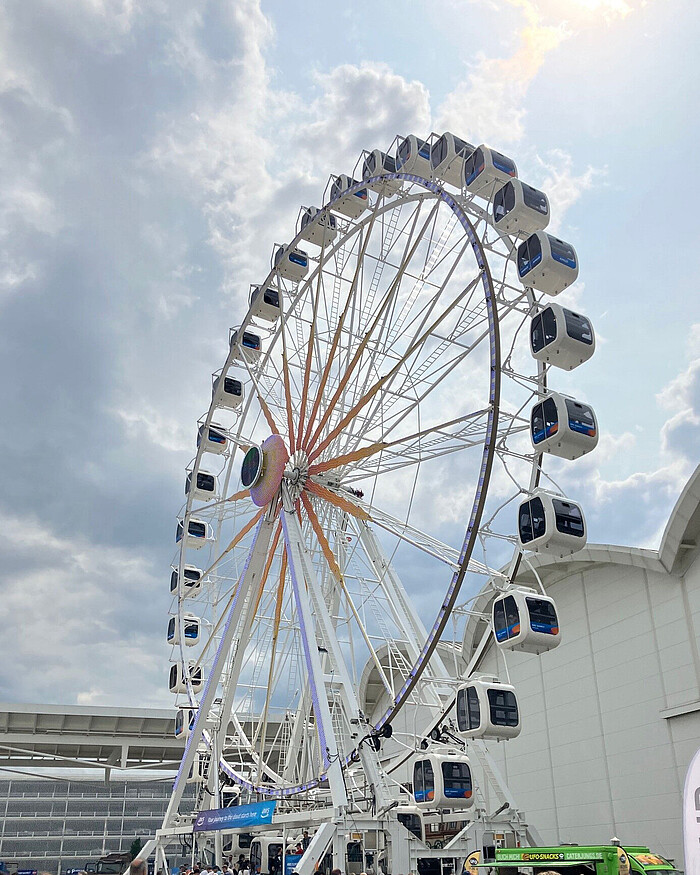 Ferris wheel in front of the Hamburg exhibition halls at the AWS Summit 2025 Ferris wheel in front of the Hamburg exhibition halls at the AWS Summit 2025